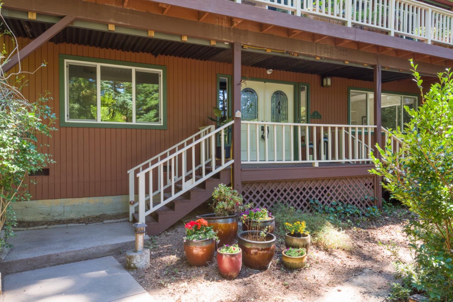 8 Big Tree Way Woodside, CA 94062 - Photo 29 of 31 a view of a deck with a bench