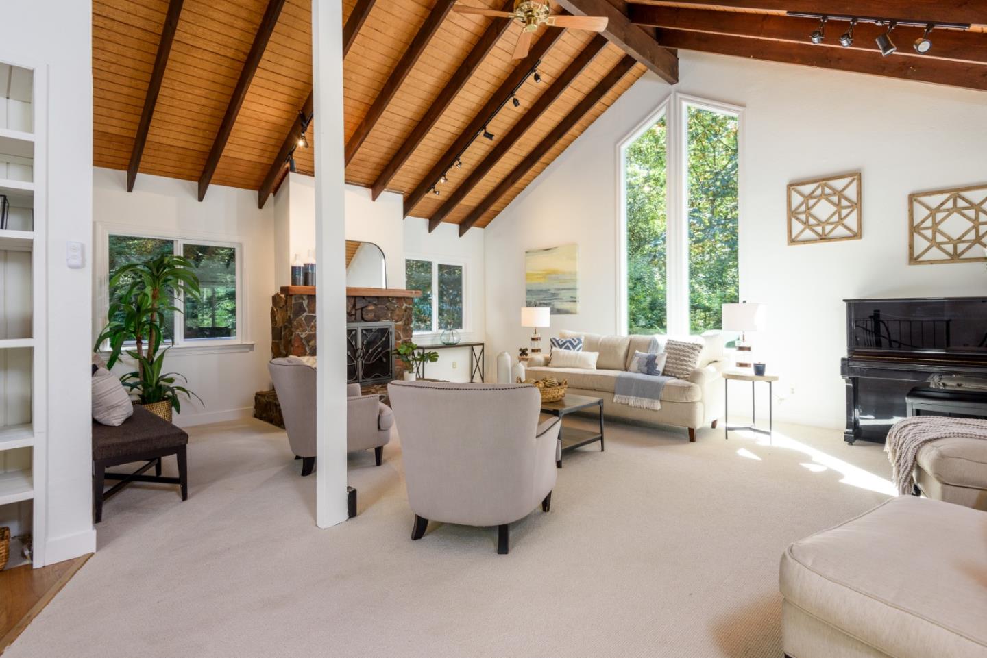 8 Big Tree Way Woodside, CA 94062 - Photo 3 of 31 a living room with furniture and a flat screen tv