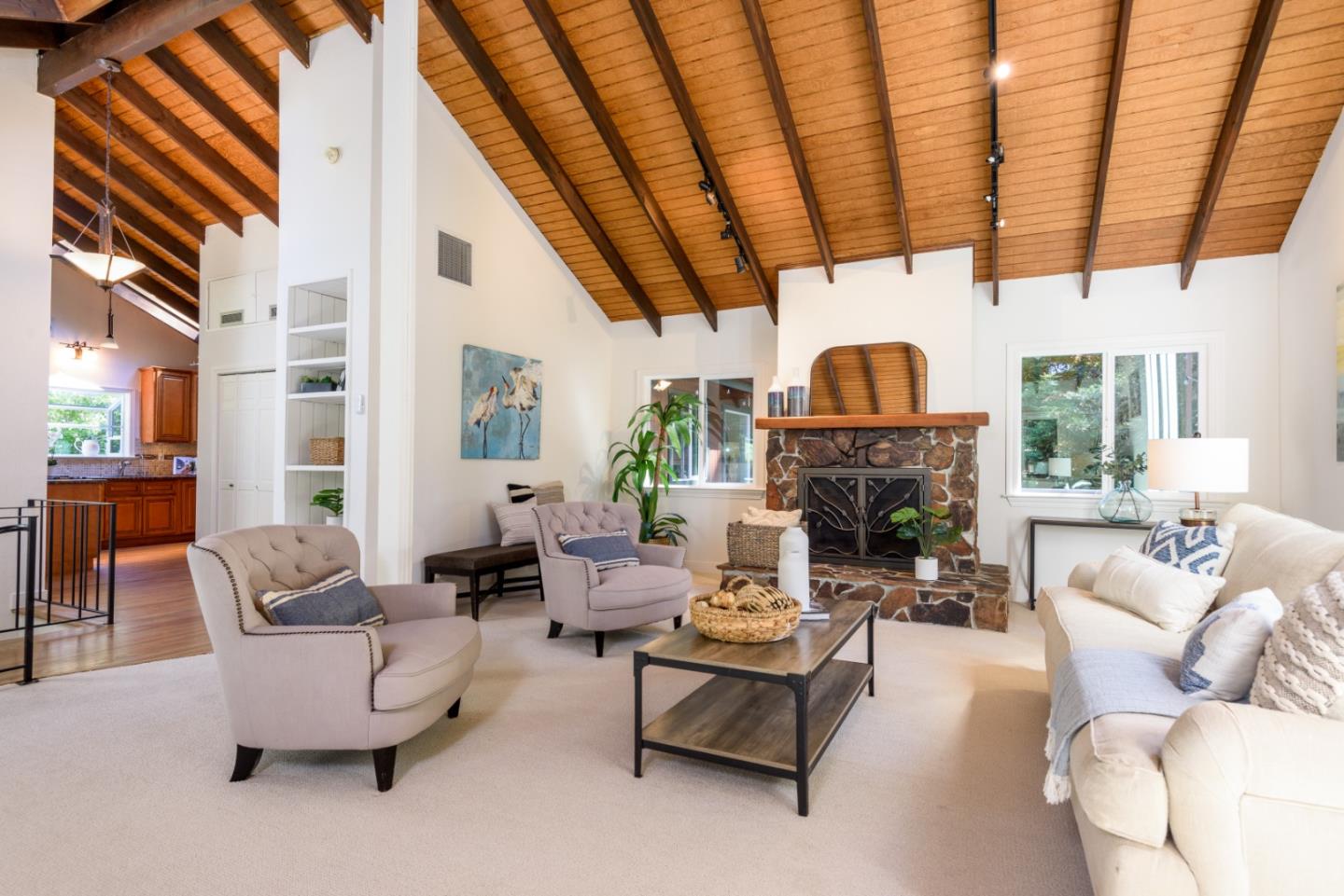 8 Big Tree Way Woodside, CA 94062 - Photo 4 of 31 a living room with furniture a fireplace and a large window