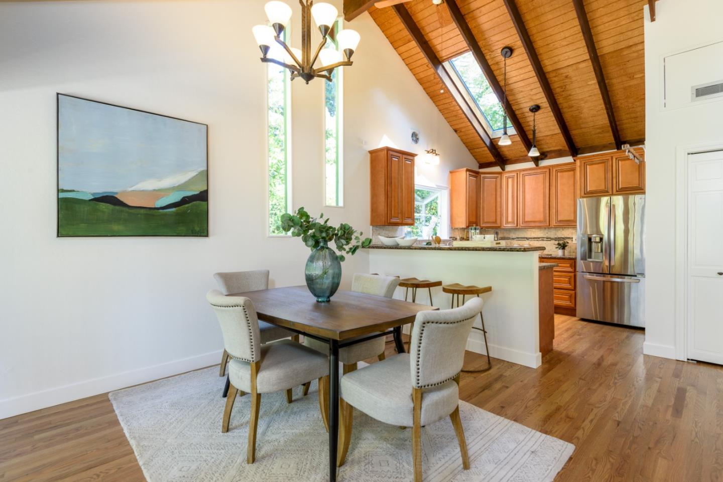 8 Big Tree Way Woodside, CA 94062 - Photo 7 of 31 a view of a dining room with furniture and wooden floor
