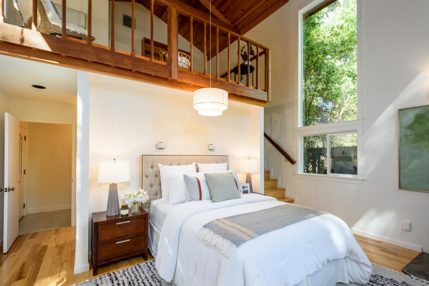 8 Big Tree Way Woodside, CA 94062 - Photo 10 of 31 a bedroom with a bed and a window