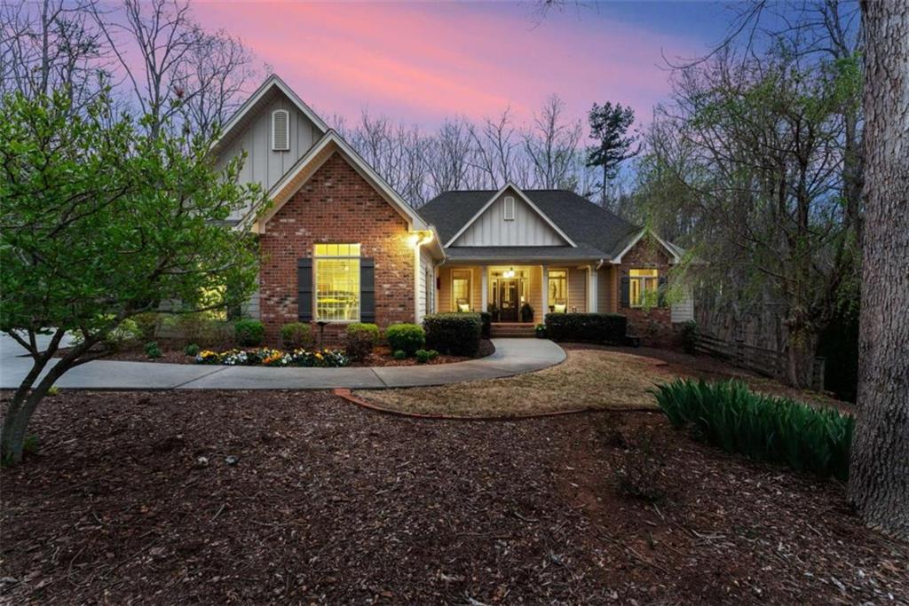 167 Early Red Pippin Clarkesville, GA 30523 - Photo 1 of 59 a front view of a house with a yard and garage