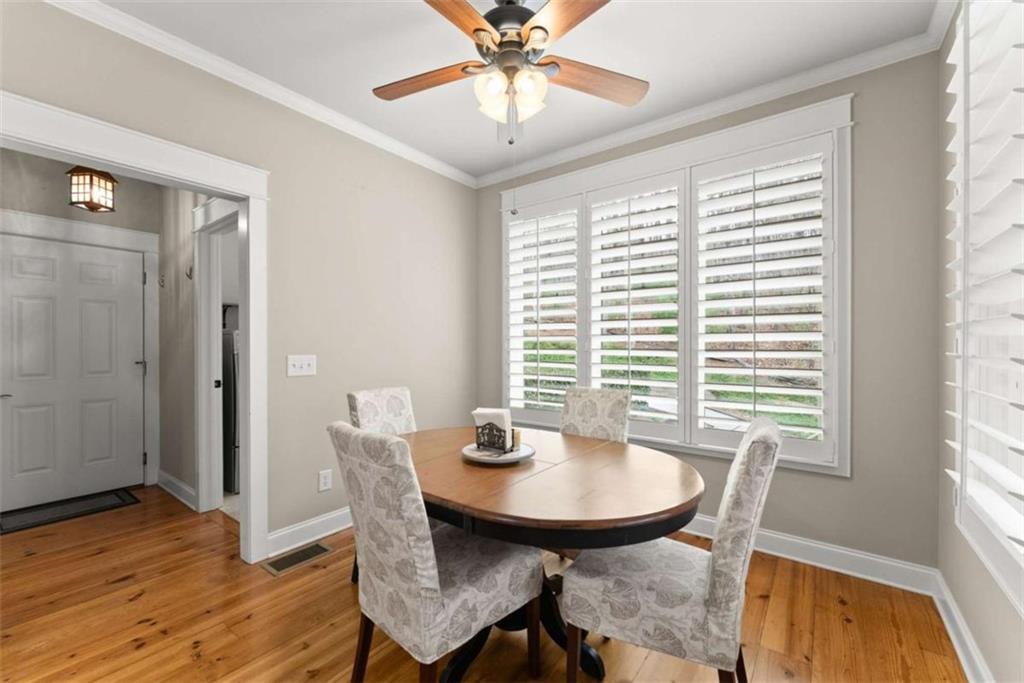 167 Early Red Pippin Clarkesville, GA 30523 - Photo 17 of 59 a view of a dining room with furniture and wooden floor