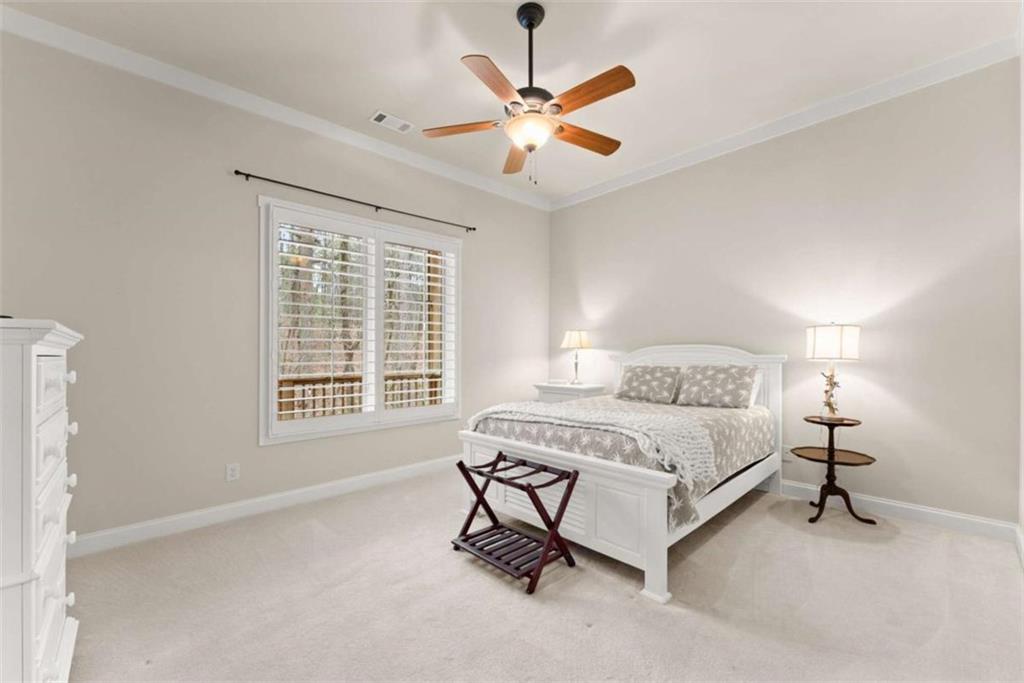 167 Early Red Pippin Clarkesville, GA 30523 - Photo 38 of 59 a spacious bedroom with a bed and a window