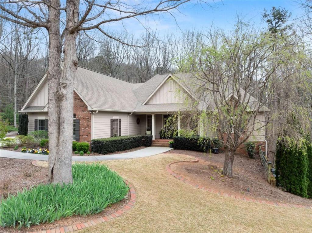 167 Early Red Pippin Clarkesville, GA 30523 - Photo 47 of 59 a front view of a house with a yard and trees