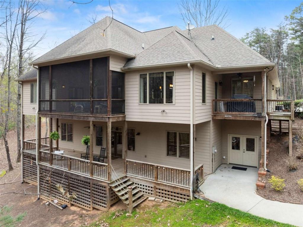 167 Early Red Pippin Clarkesville, GA 30523 - Photo 50 of 59 a view of a house with a yard and floor to ceiling window