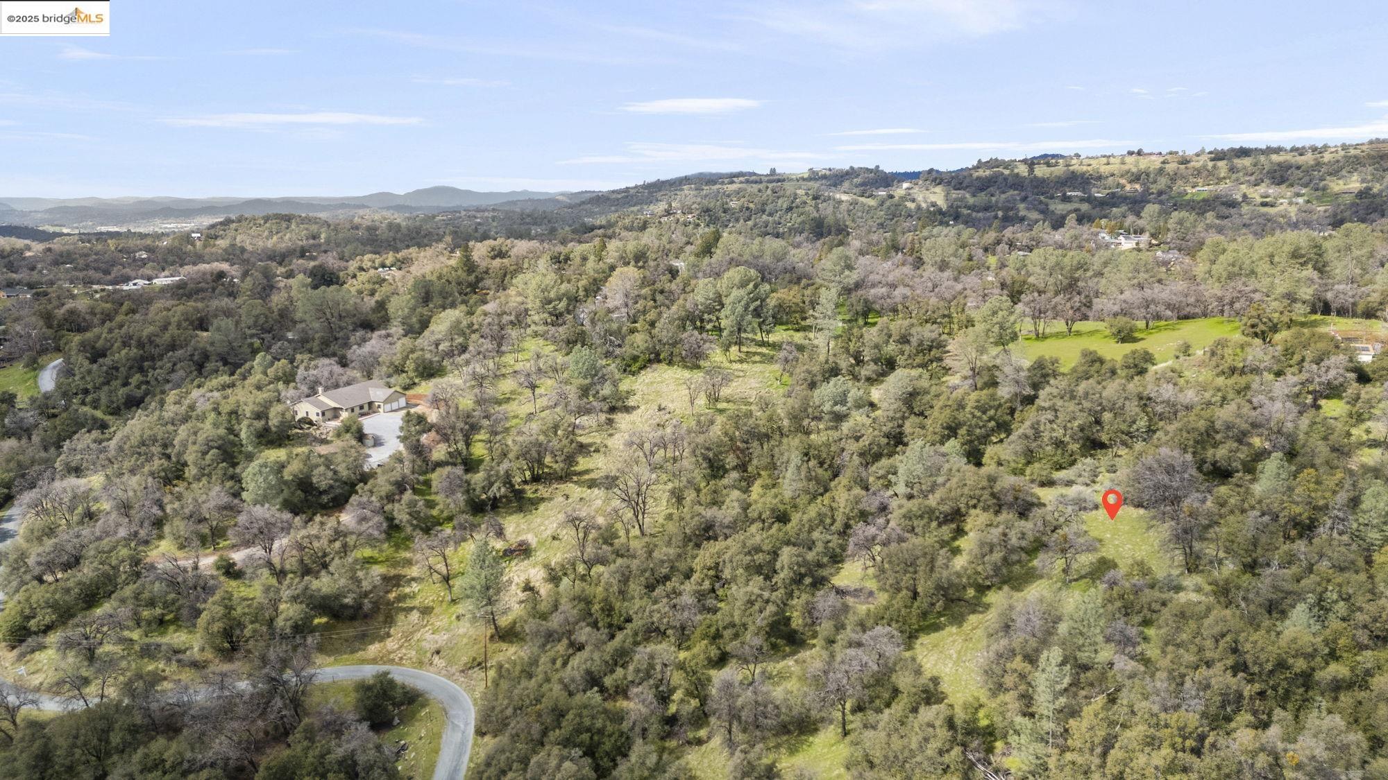 19631 Whitto Mine Road Sonora, CA 95370 - Photo 3 of 12 an aerial view of houses covered in trees
