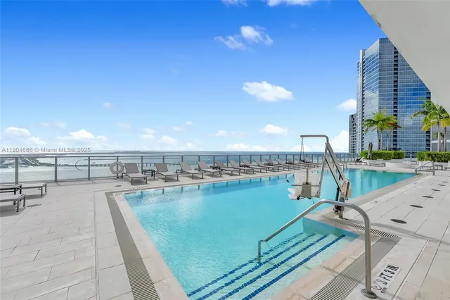 a view of a balcony with ocean view