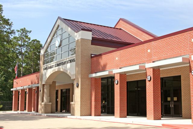 a view of a house with a street