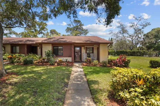 a front view of a house with a porch