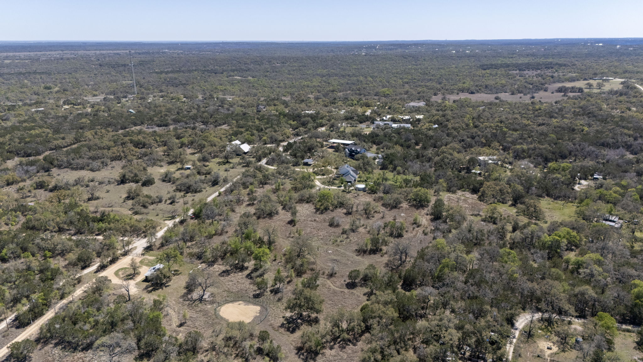 453 Nameless Road Driftwood, TX 78619 - Photo 14 of 35 an aerial view of house with yard and mountain view in back