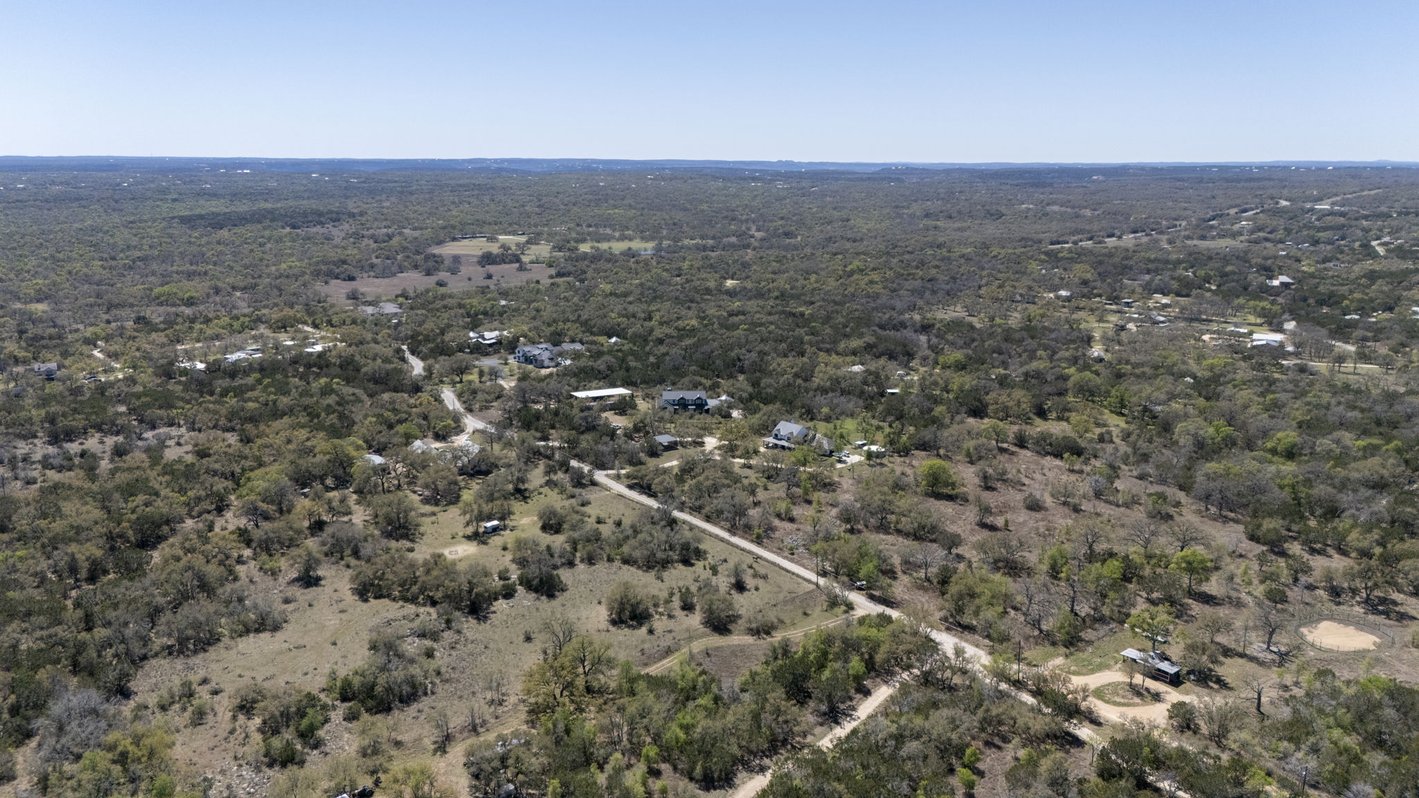 453 Nameless Road Driftwood, TX 78619 - Photo 17 of 35 an aerial view of house with yard and mountain view in back