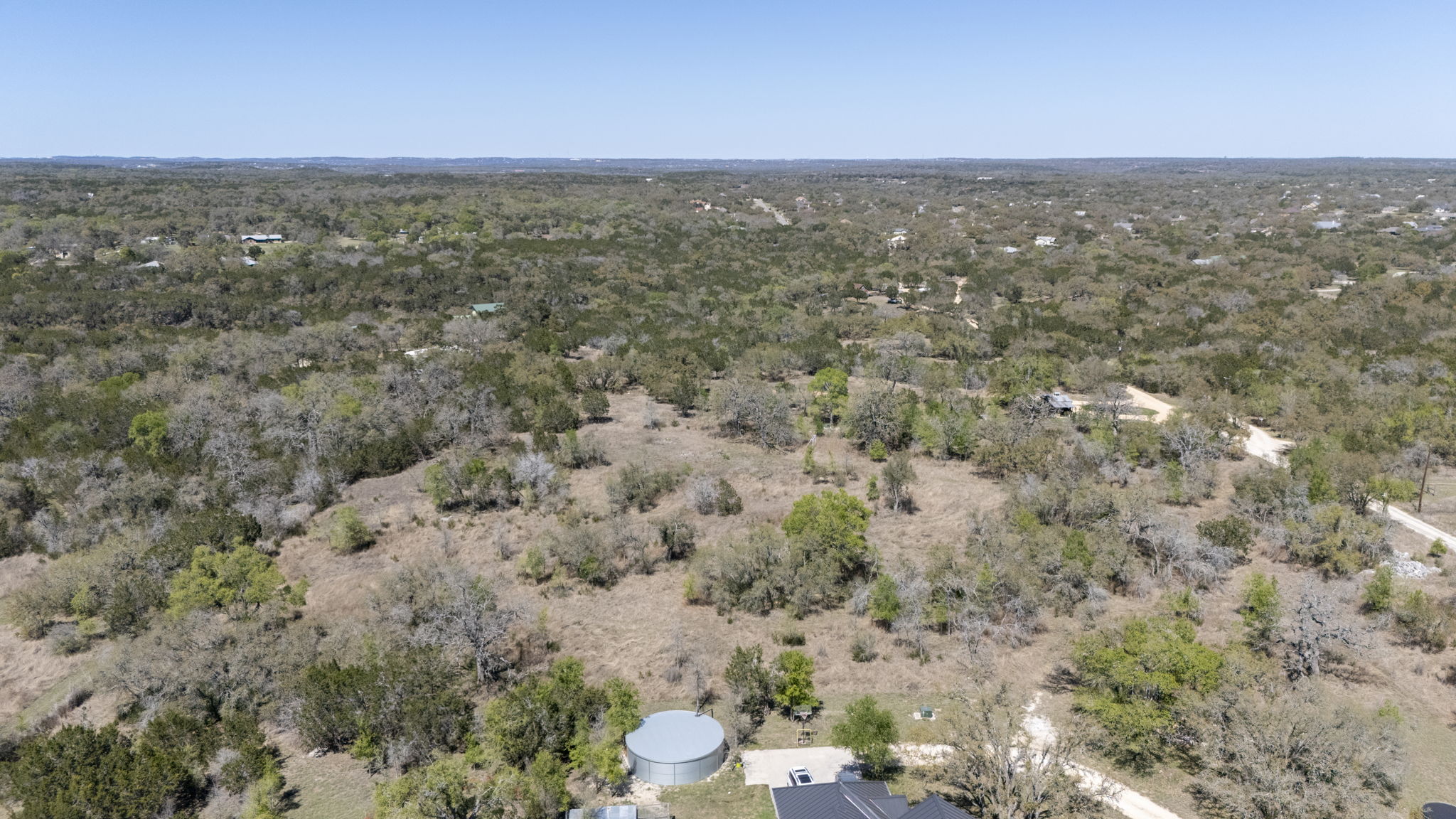 453 Nameless Road Driftwood, TX 78619 - Photo 21 of 35 an aerial view of house with yard