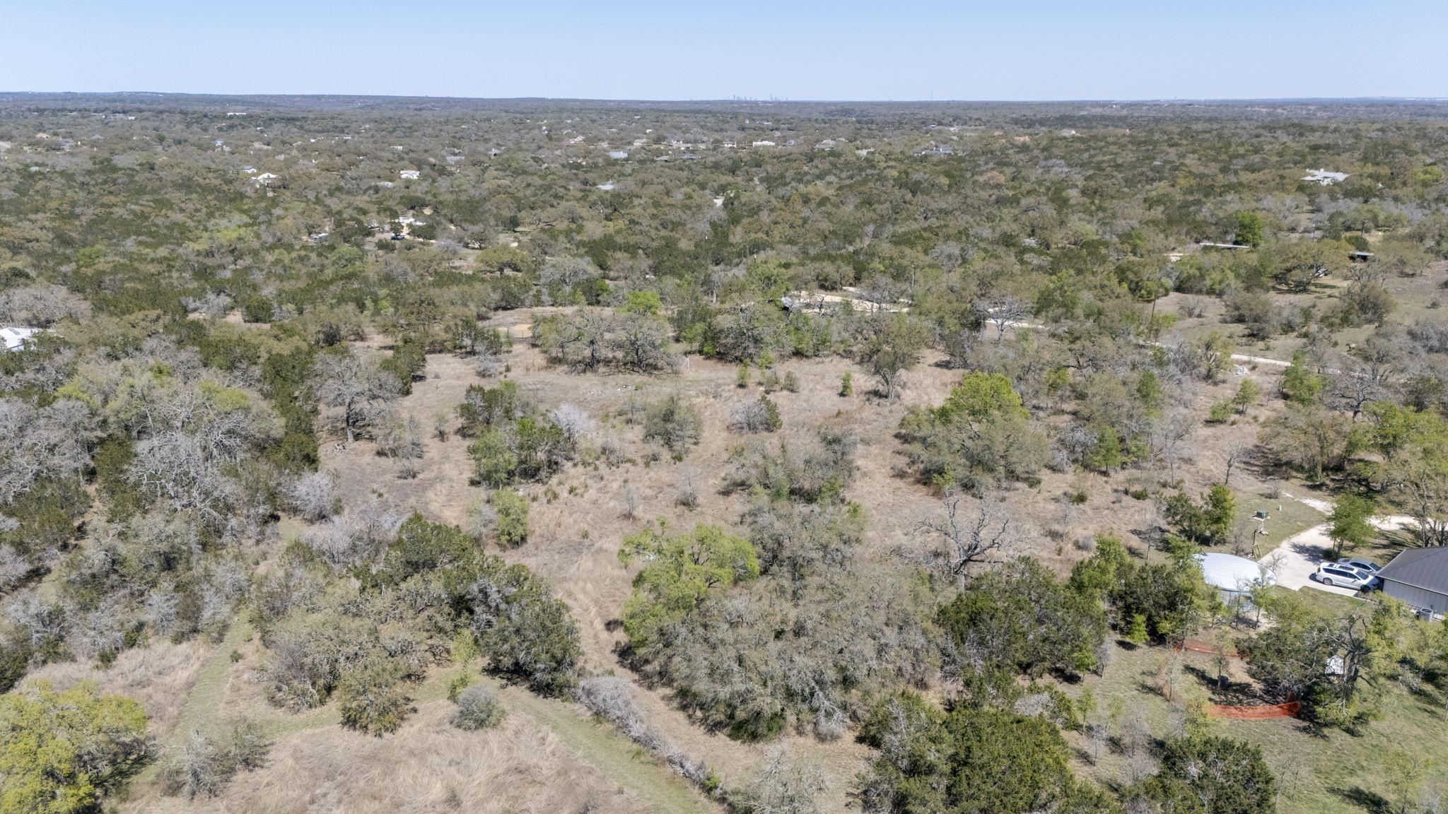 453 Nameless Road Driftwood, TX 78619 - Photo 22 of 35 a view of city with tall buildings