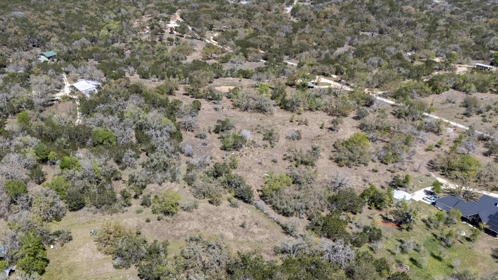 453 Nameless Road Driftwood, TX 78619 - Photo 9 of 35 a view of a dry yard