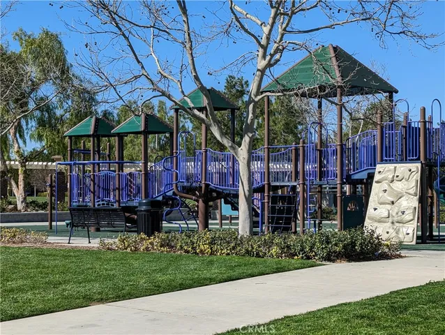a view of a backyard and ocean view