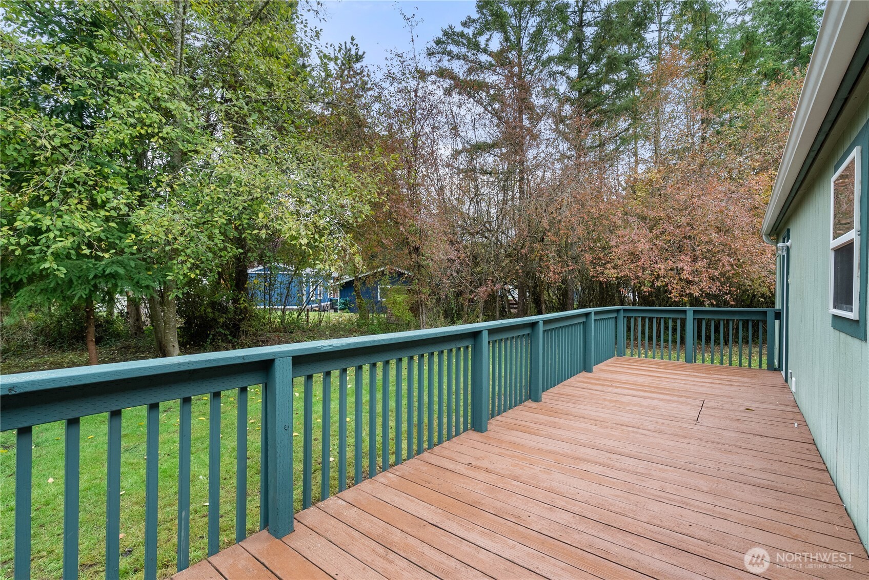 11727 Driver Street Southwest Olympia, WA 98512 - Photo 19 of 33 a balcony with trees in front of it