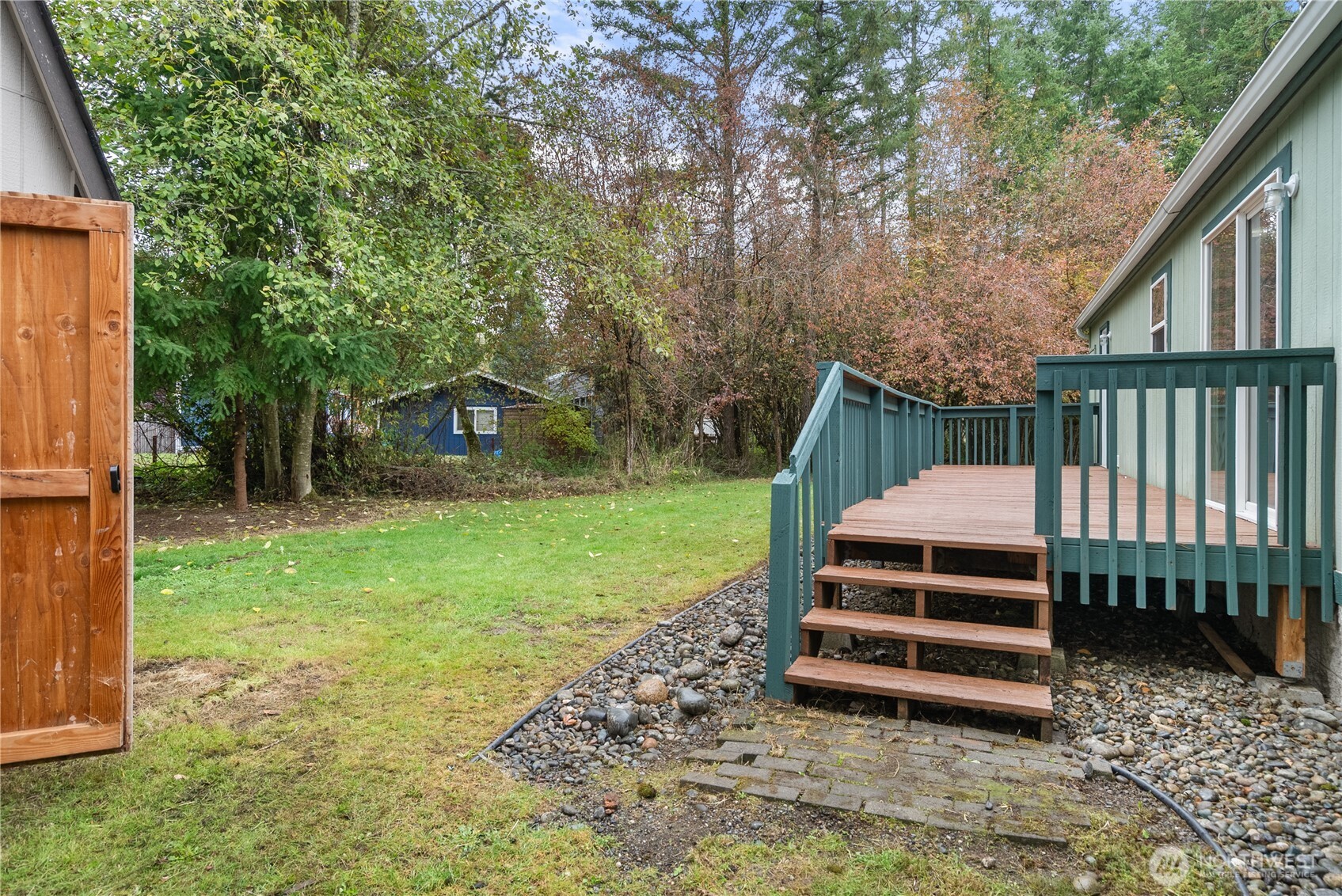 11727 Driver Street Southwest Olympia, WA 98512 - Photo 20 of 33 a front view of a house with a garden