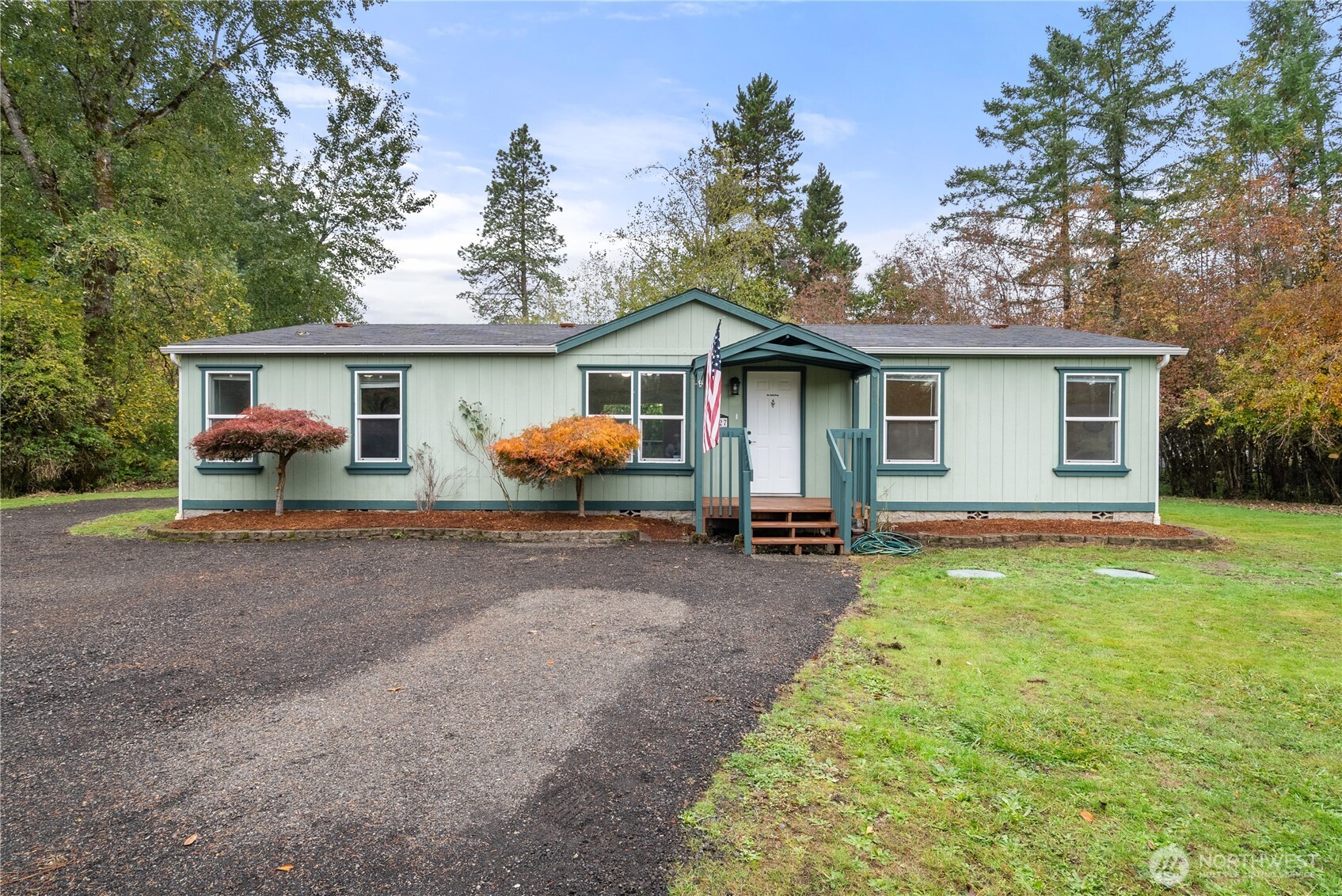 11727 Driver Street Southwest Olympia, WA 98512 - Photo 2 of 33 a view of a house with backyard and chairs