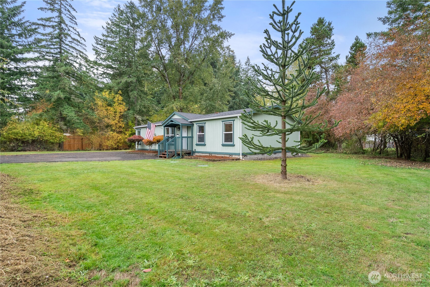 11727 Driver Street Southwest Olympia, WA 98512 - Photo 27 of 33 a view of a house with a backyard