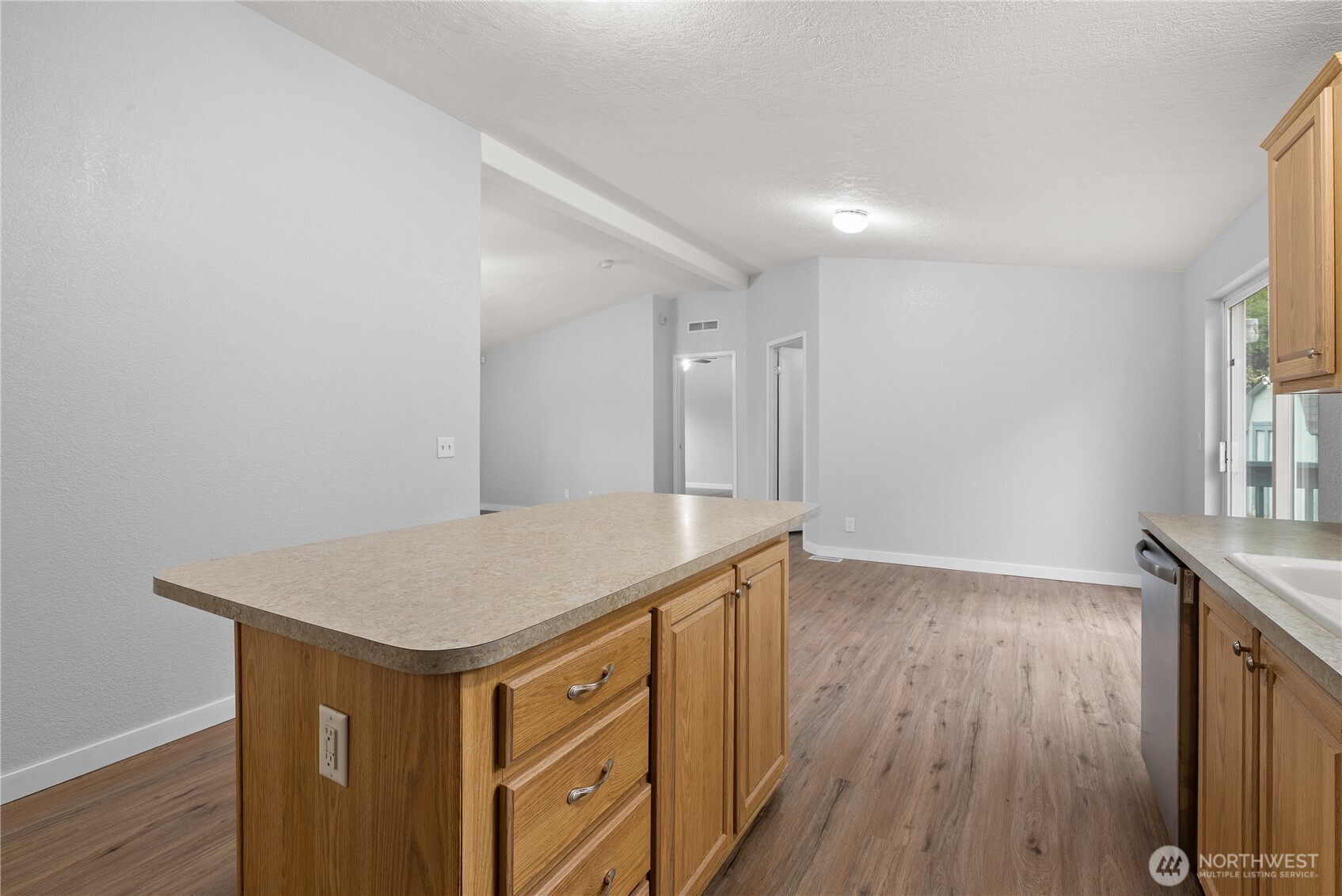 11727 Driver Street Southwest Olympia, WA 98512 - Photo 8 of 33 a kitchen with wooden floor and window