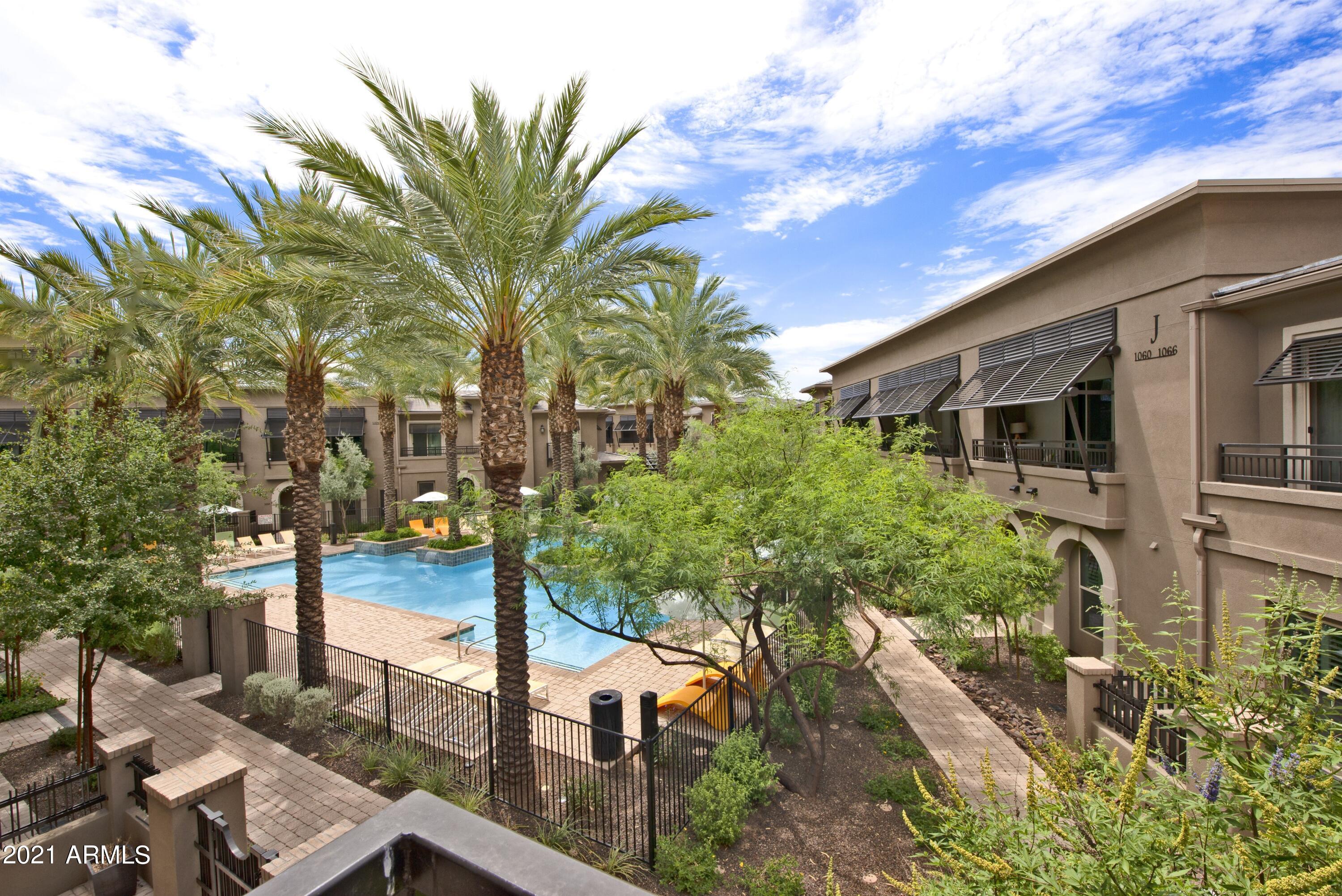6565 East Thomas Road, Unit 1042 Scottsdale, AZ 85251 - Photo 20 of 22 a view of a house with a tree