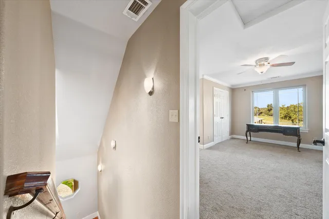 a view of dining room with furniture and a window