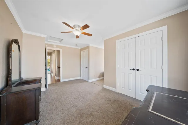 a view of a balcony with wooden floor