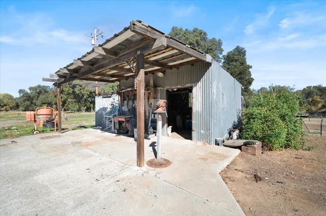 a view of yard with swimming pool
