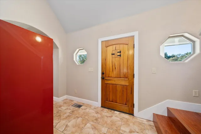 a view of a livingroom with wooden floor
