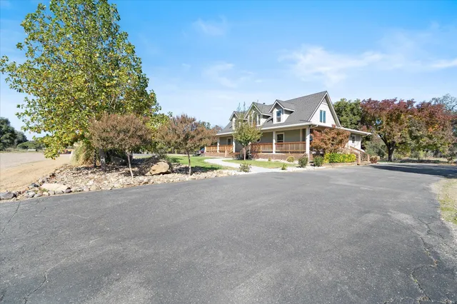 a view of a pool with a yard