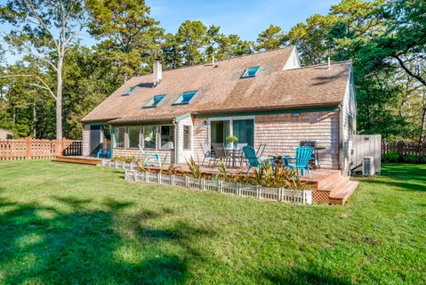 a couple of table and chairs in the garden