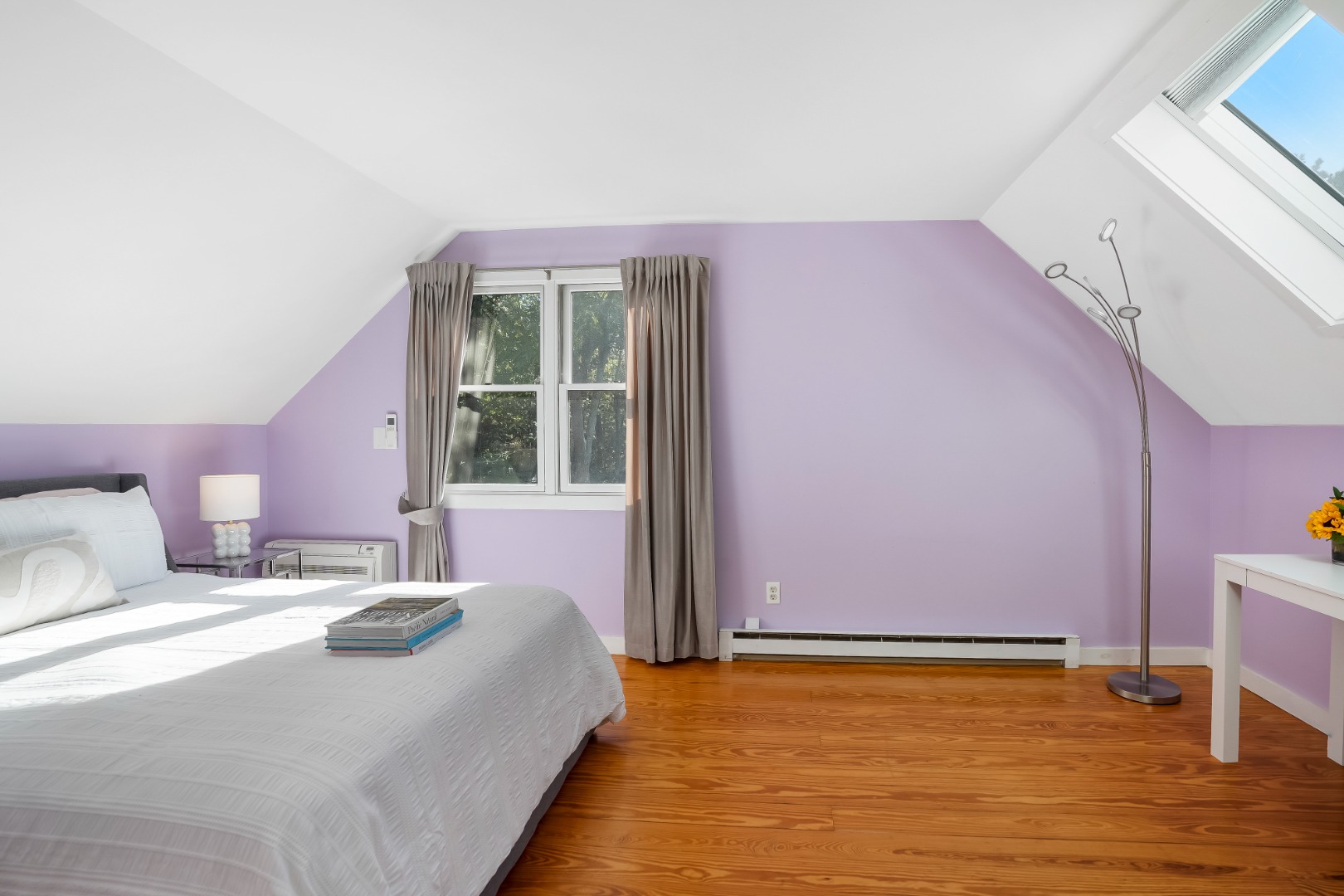 105 Stoney Hill Road West Tisbury, MA 02568 - Photo 38 of 44 a bedroom with a bed and wooden floor