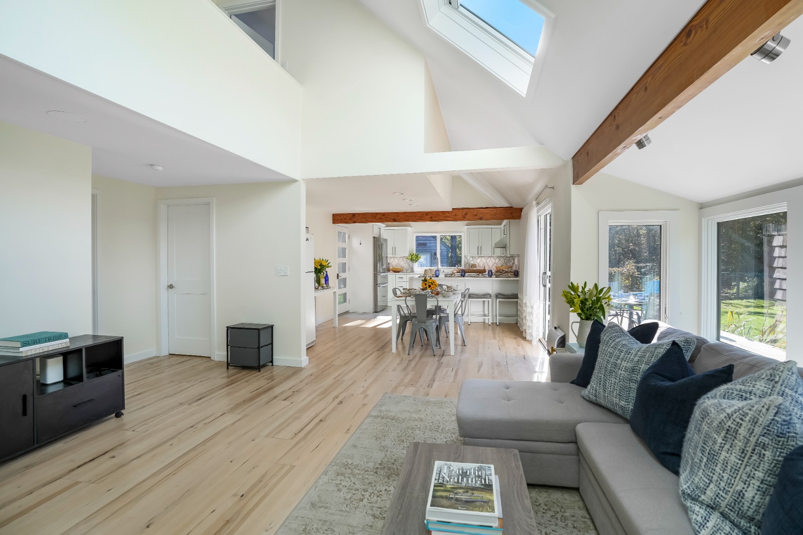 105 Stoney Hill Road West Tisbury, MA 02568 - Photo 7 of 44 a living room with furniture and a wooden floor