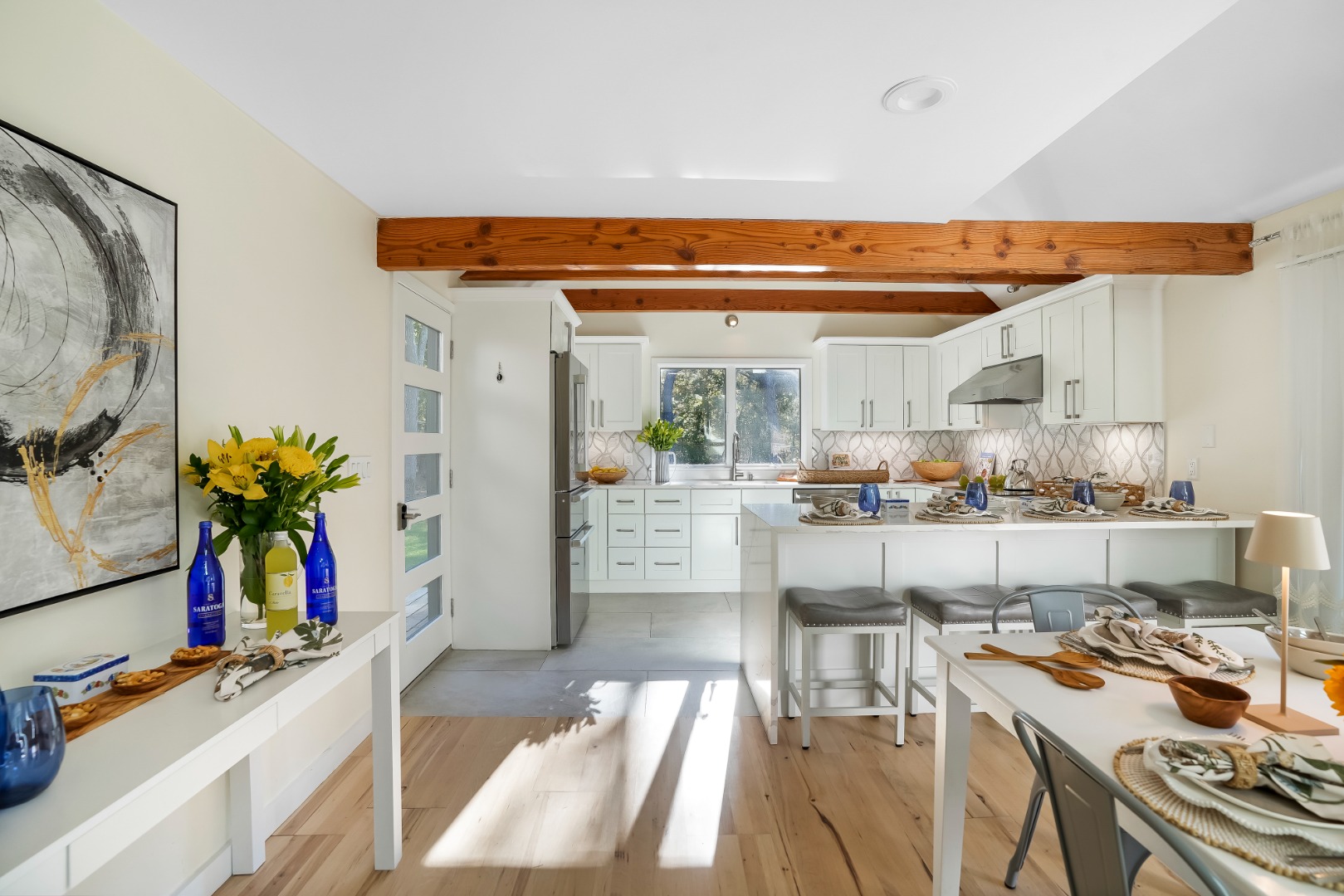 105 Stoney Hill Road West Tisbury, MA 02568 - Photo 9 of 44 a room with stainless steel appliances kitchen island granite countertop furniture and a view of kitchen