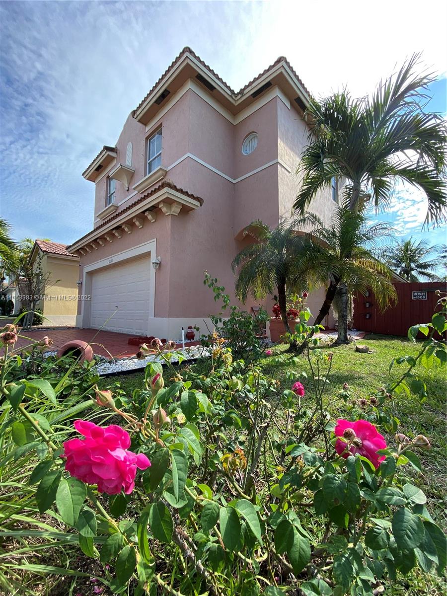 2101 Northeast 37th Road Homestead, FL 33033 - Photo 1 of 11 a view of a house with a yard and garden