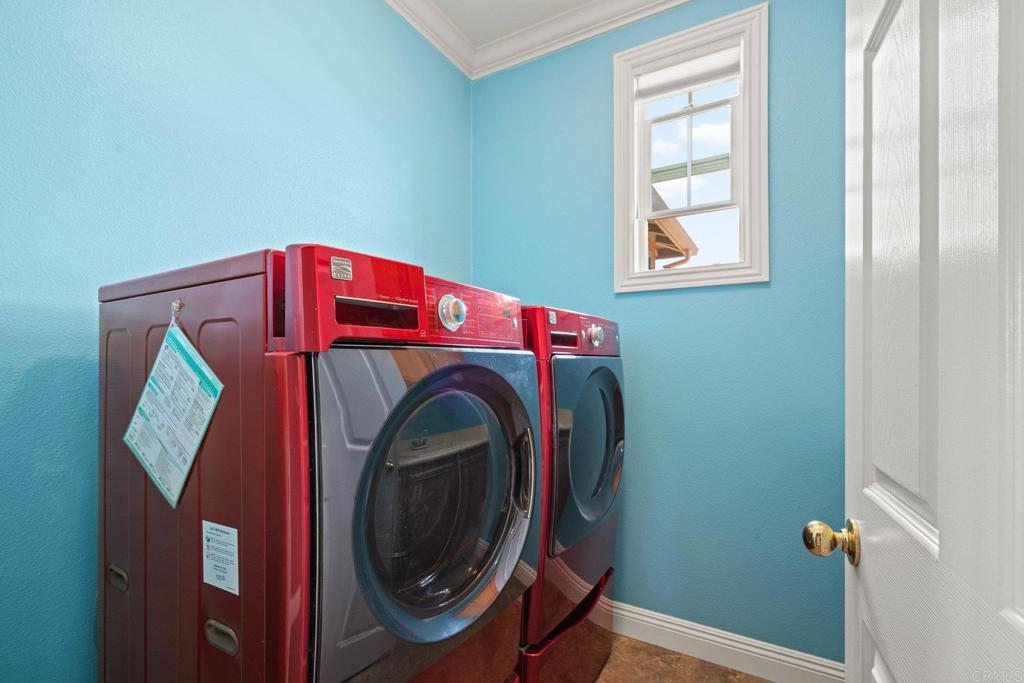 5191 Cobalt Way Oceanside, CA 92057 - Photo 38 of 61 a utility room with dryer and washer