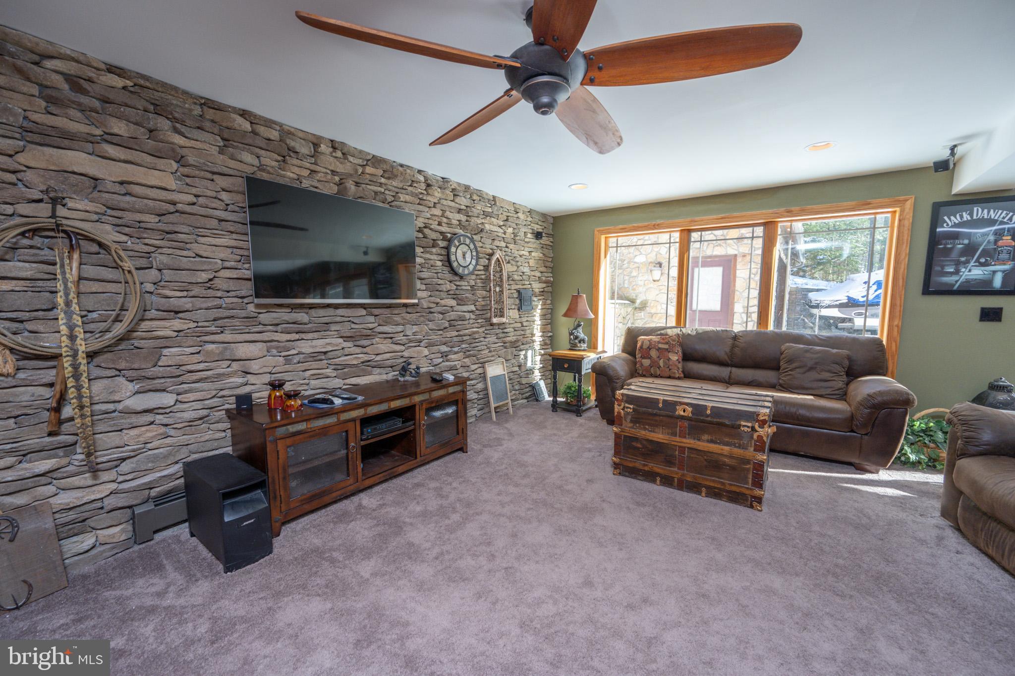 542 Bench Road Swanton, MD 21561 - Photo 25 of 60 Stunning stacked stone accent wall