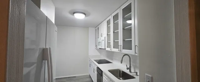 a view of a sink and a mirror