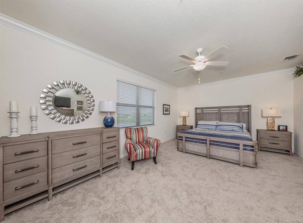 12550 Ghiberti Circle, Unit 201 Venice, FL 34293 - Photo 13 of 44 a living room with furniture