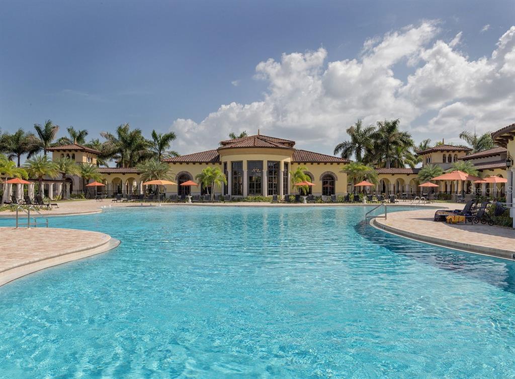 12550 Ghiberti Circle, Unit 201 Venice, FL 34293 - Photo 34 of 44 a view of a house with a big yard