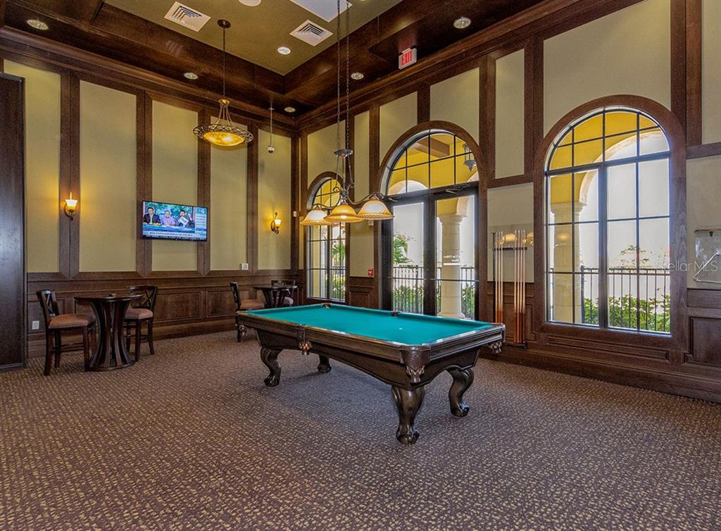 12550 Ghiberti Circle, Unit 201 Venice, FL 34293 - Photo 37 of 44 a room with pool table and windows