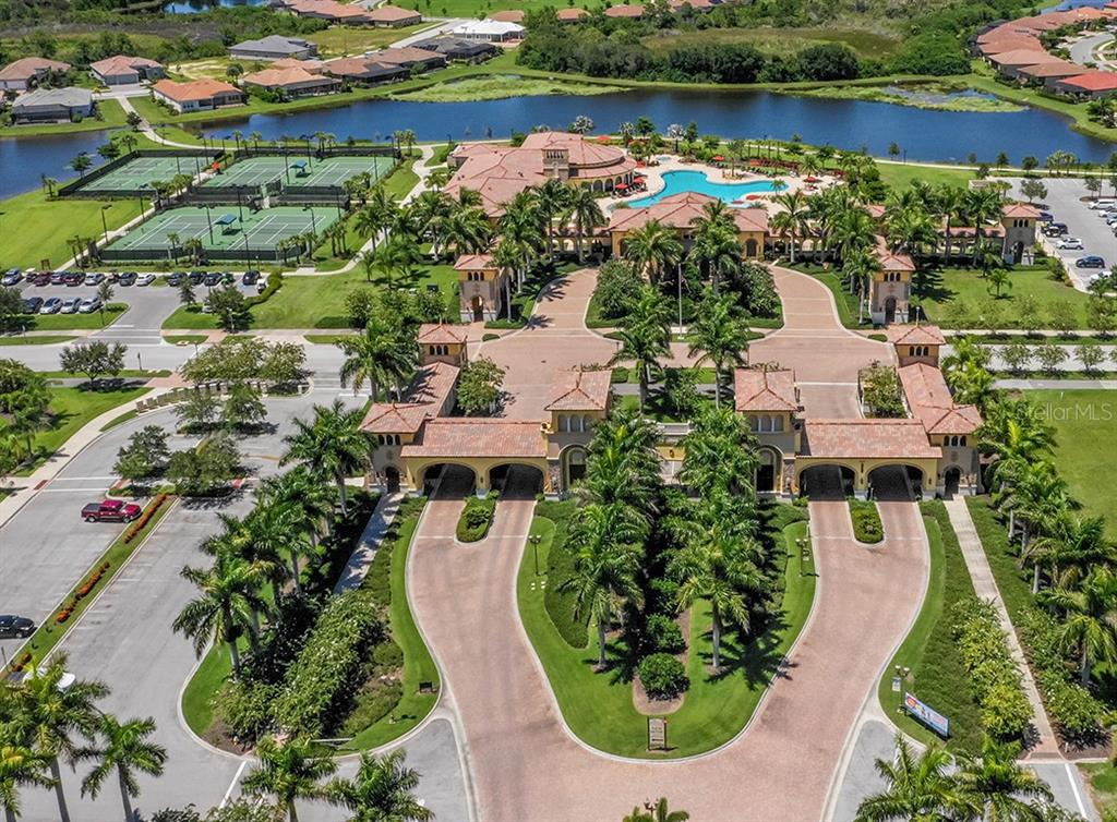 12550 Ghiberti Circle, Unit 201 Venice, FL 34293 - Photo 42 of 44 an aerial view of a house with outdoor space and lake view