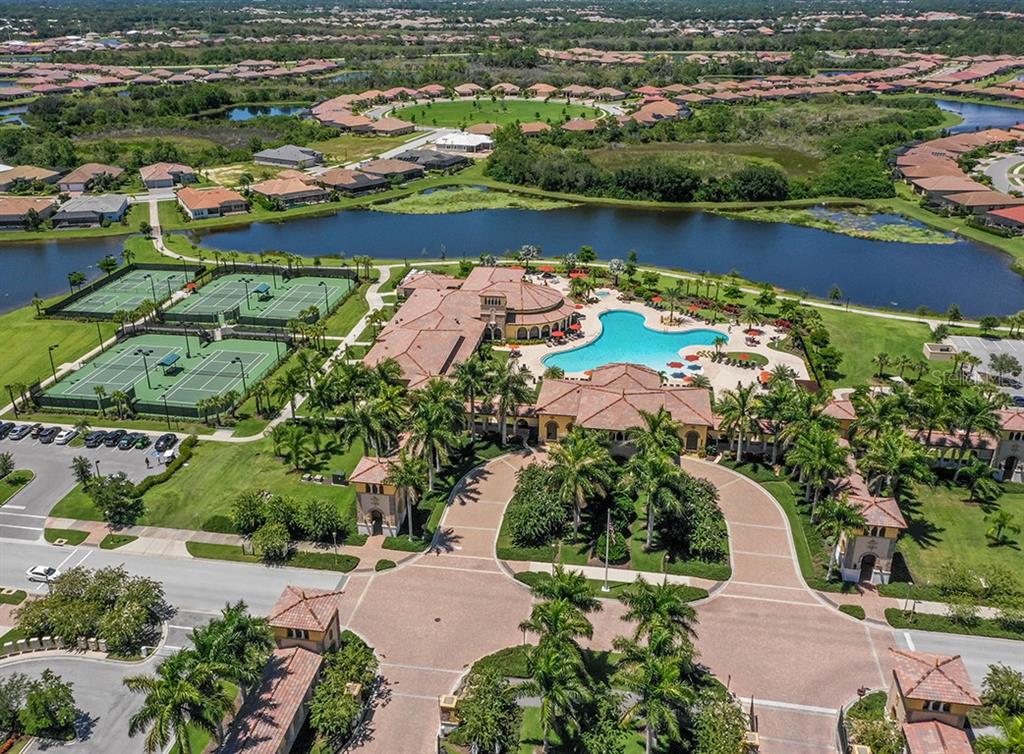 12550 Ghiberti Circle, Unit 201 Venice, FL 34293 - Photo 43 of 44 an aerial view of a houses with outdoor space