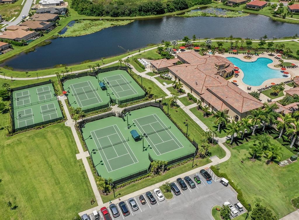 12550 Ghiberti Circle, Unit 201 Venice, FL 34293 - Photo 44 of 44 an aerial view of a house with a lake view