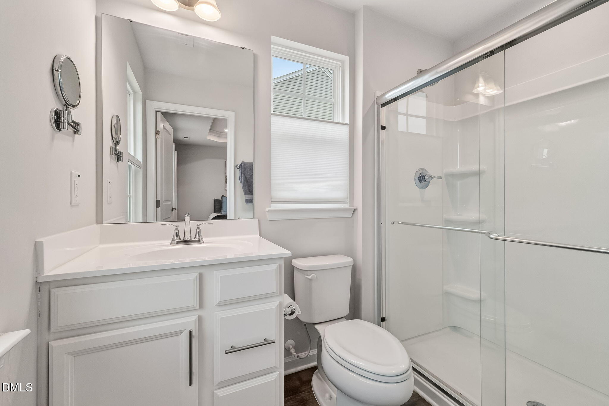 4922 Crossley Street Raleigh, NC 27616 - Photo 16 of 28 a bathroom with a sink a toilet and shower