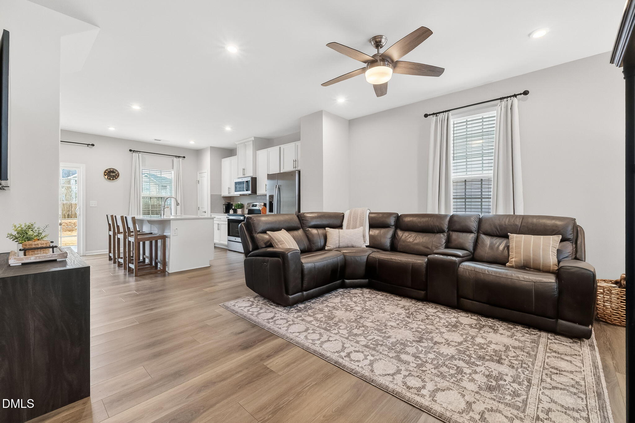 4922 Crossley Street Raleigh, NC 27616 - Photo 6 of 28 a living room with furniture and kitchen view