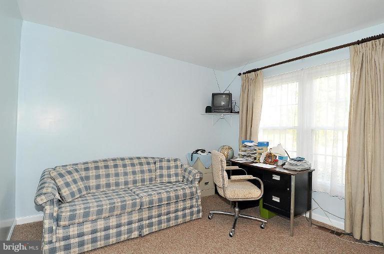 4107 Ulster Road Beltsville, MD 20705 - Photo 14 of 21 a bedroom with a bed and a window