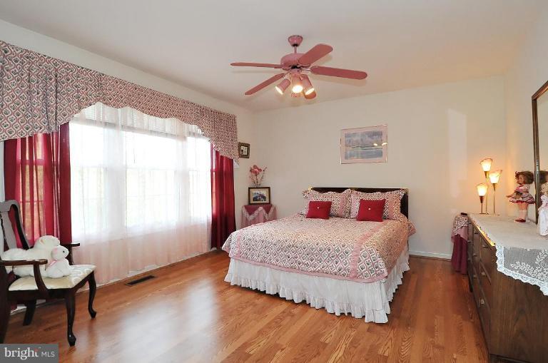 4107 Ulster Road Beltsville, MD 20705 - Photo 17 of 21 a bedroom with a bed and window