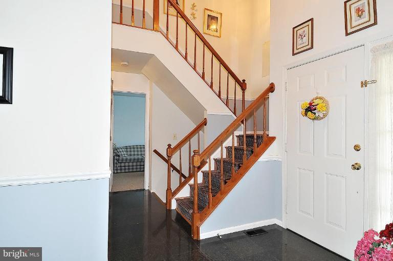 4107 Ulster Road Beltsville, MD 20705 - Photo 5 of 21 a view of entryway and hall with a dining room